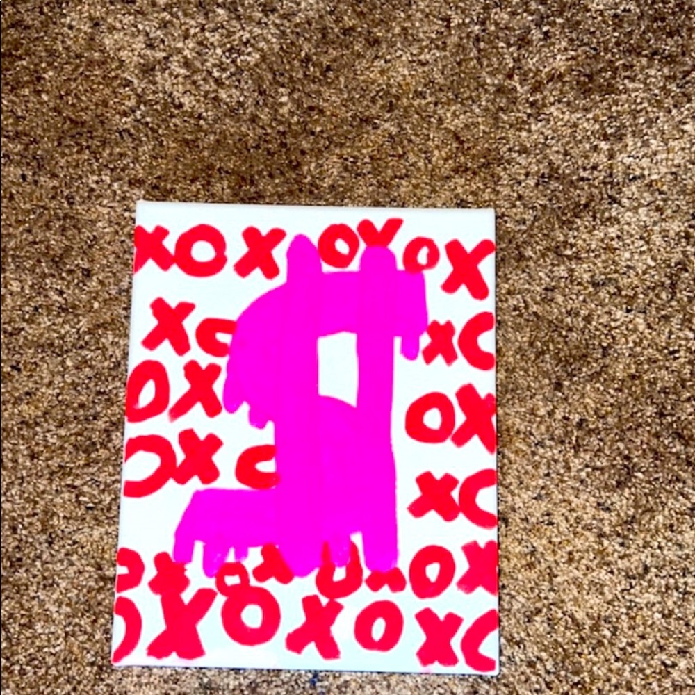 I’m selling a pink and red money symbol painting